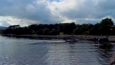 A-4K-shot-of-a-speedboat-being-put-on-to-a-trailer-in-Kenmare-harbour