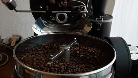 slow-motion-shot-of-roasting-process-of-freshly-roasted-coffee-in-mexico