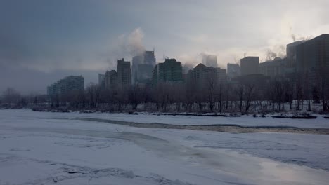 Frozen-River-Skyscrapers-Steaming-Downtown-Calgary-Pan