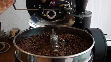 slow-motion-shot-of-roasting-process-of-freshly-roasted-coffee
