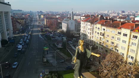 Iconic-Saint-Sofia-Statue-at-Sofia-Square,-Traffic-across-the-streets-of-Sofia