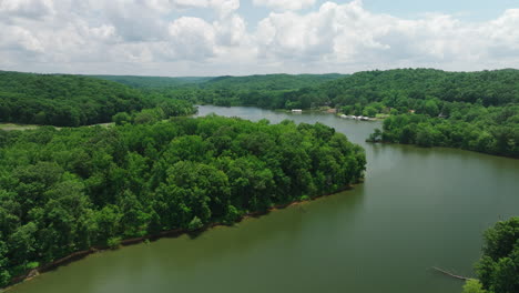 Aerial-View-Of-Tranquil-River-Surrounded-With-Lush-Vegetation-In-Mousetail-Landing-State-Park,-Linden,-Tennessee,-USA---drone-shot