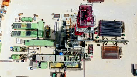 Top-Down-View-Of-Drilling-Rig-For-Oil-And-Gas-At-Daytime---drone-shot
