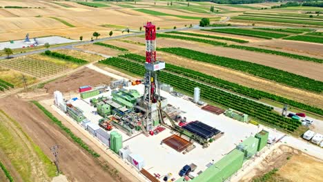 Aerial-View-Of-Oil-Drilling-Rig-And-Equipments-On-The-Rural-Fields---Natural-Oil-And-Gas