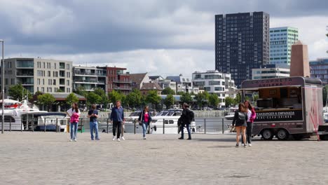 People-walking-in-Antwerp's-trendy-quarter-'Het-Eilandje
