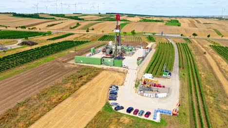 Drilling-Rig-Extracting-Natural-Gas-And-Oil-In-Austria---aerial-drone-shot