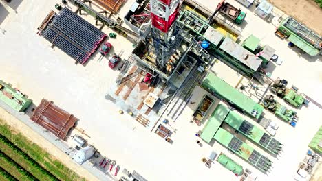Top-View-Of-Oil-And-Gas-Drilling-Rig---aerial-drone-shot