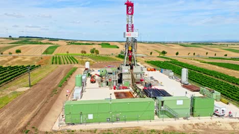 Oil-And-Gas-Drilling-Rig-Onshore-In-Austria---aerial-drone-shot