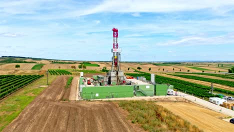 Aerial-View-Of-Land-Oil-Drilling-Rig-In-Austria-At-Daytime---drone-shot