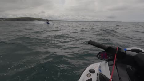 POV-shot-of-a-jet-ski-instructor-racing-across-the-sea-makes-a-large-wake