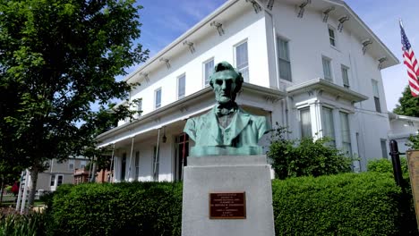 President-Abraham-Lincoln-statue-in-Geneseo,-Illinois-with-gimbal-video-walking-forward