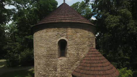 Historic-and-renovated-medieval-tower-in-a-park-in-a-city-in-Europe