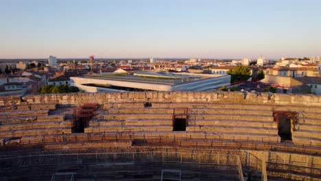 The-view-from-the-ancient-arena:-Revealing-the-sunset-at-the-Musée-de-la-Romanité-from-the-arenes-de-nimes