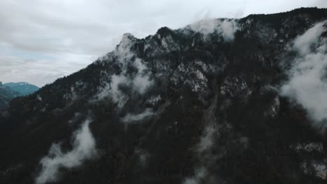 atmospheric-and-moody-drone-footage-of-mountainous-landscapes-in-Austria-with-wet-and-misty-conditions