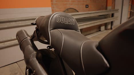 Ducati-motorcycle-black-seat-in-a-garage