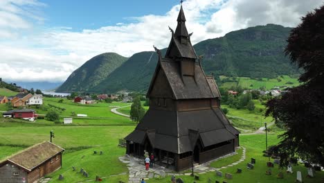 Aerial-forward-dolly-towards-Historic-Hopperstad-Stave-Church,-Vik,-Norway