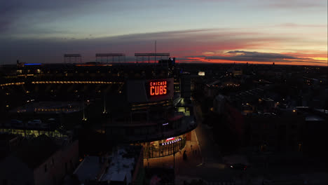 Aerial-Pullback-Away-from-Wrigley-Field-during-Amazing-Sunset