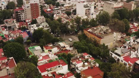 Apartment-buildings-and-streets-of-Mexico-city-suburbs,-aerial-drone-view