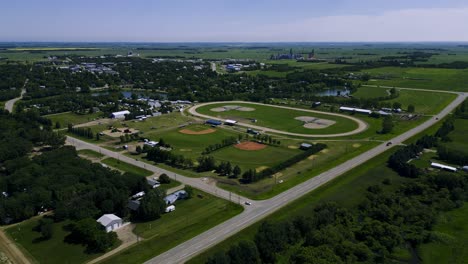 A-Drone-Flies-over-the-Small-Farming-Town-Community-Municipality-of-Killarney-Manitoba-in-Turtle-Mountain-Park-Southern-Canada