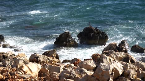 Rough-waves-of-the-Adriatic-Sea-crashing-against-the-rocky-shore-of-Albanian-beach