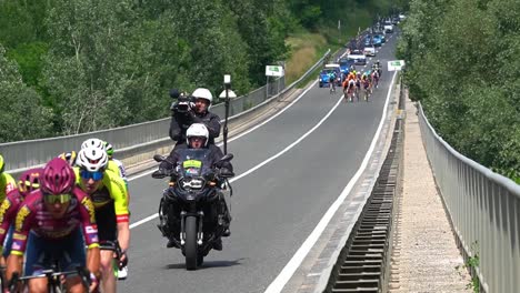 Stunning-HD-footage-of-tour-around-Slovenia,-showcasing-cyclists-riding-along-the-Ormož-Avenue