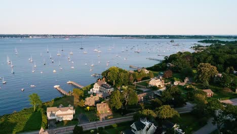 Aerial-view-of-waterfront-property-with-sailboats-in-the-bay