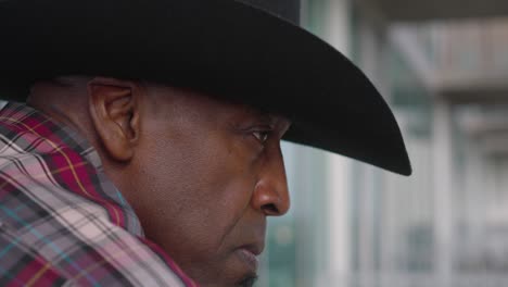 Side-portrait-shot-of-Black-man-with-Cowboy-hat