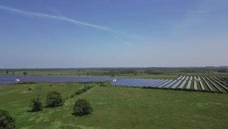Solar-Panels-On-Lush-Green-Field