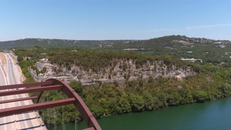 Drone-shot-reveal-of-the-Pennybacker-360-bridge-in-Austin,-Texas