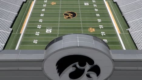 Kinnick-stadium-on-the-campus-of-the-University-of-Iowa,-home-of-the-Iowa-Hawkeyes-in-Iowa-City,-Iowa-with-drone-video-pulling-back-parallax