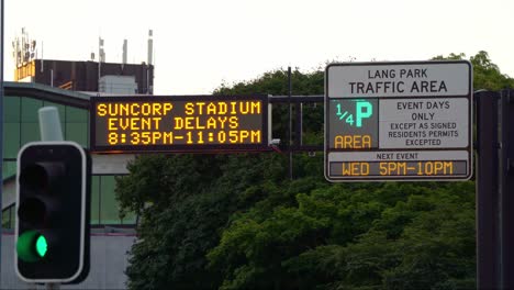 Static-shot-capturing-the-LED-congestion-sign-displaying-Suncorp-Stadium-Event-Delays-next-to-the-traffic-lights