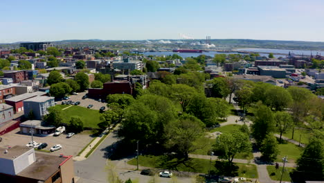Aerial-view-of-Uptown-Saint-John-cityscape-with-the-Oasis-of-the-Seas-cruise-ship-docked-in-port