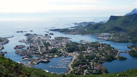 The-city-of-Svolvaer-seen-from-above-on-a-sunny-day-in-Lofoten,-Norway