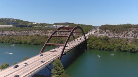 Establishing-drone-shot-of-the-Pennybacker-Bridge-over-Lake-Austin-in-Austin,-Texas