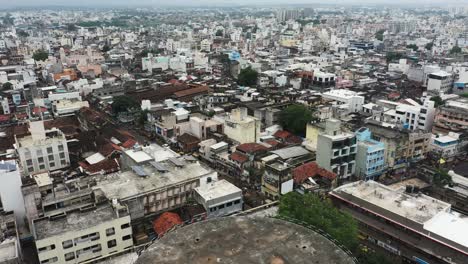 Aerial-view-of-old-Rajkot-still-showing-many-tubular-residential-houses-surrounded-by-high-rise-buildings