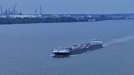 Cargo-ship,-Olesia-at-Moerdijk.-Shipping-industry.Aerial,-parallax