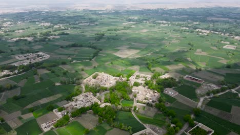 Flying-Over-Muddy-Homes-and-Farm-Land