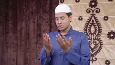 Muslim-man-reading-Holy-Namaz-and-praying-to-God