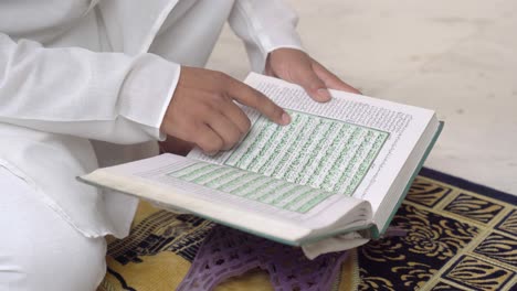 Closeup-shot-of-Indian-muslim-man-reading-Quran