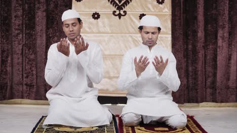 Muslim-men-reading-Namaz-prayers-at-home