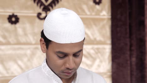 Muslim-man-finishes-reading-Namaz-and-praying-to-Allah