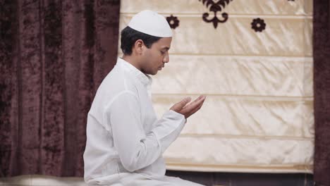 Indian-muslim-man-reading-Namaz-at-home-to-Allah