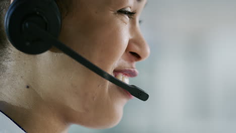 a-young-woman-using-a-headset-in-an-office