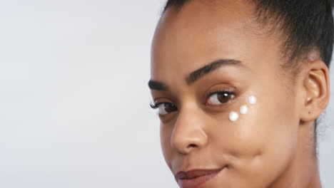 Black-woman,-skincare-and-facial-cream-cosmetic