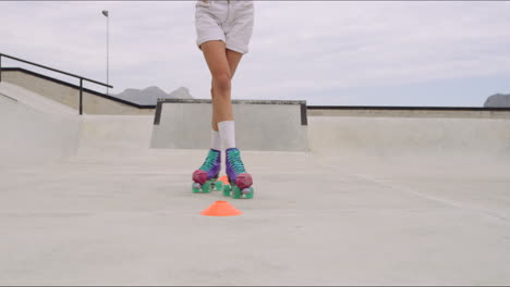 Cool-skilled-skater-forming-patterns-around-cones