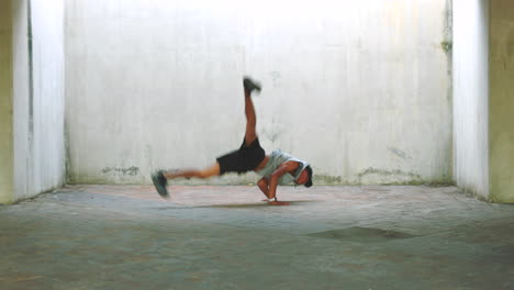 Fitness,-hip-hop-and-breakdance-athlete-man-stunt