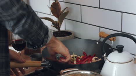 Pepper-hand,-mushroom-and-man-cooking-vegan