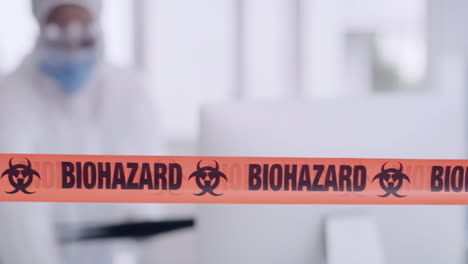 Orange-biohazard-barrier-tape-blocking