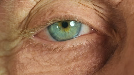 Senior-eye,-vision-and-medical-eye-exam-with-light