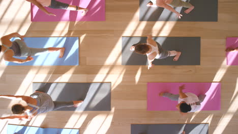 Top-view,-yoga-and-women-in-zen-fitness